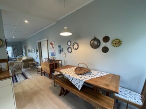 The inside dining space can accommodate up to eight guests. 