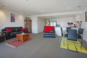 Open kitchen, living and dinning areas