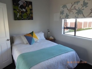 Bedroom 2 with queen Bed and Tv