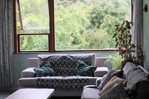 Comfy couches with garden views