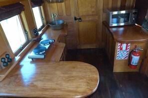 Kitchen - hob, sink and microwave/oven