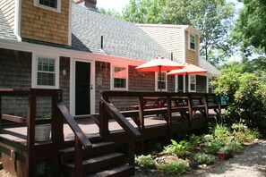 Great oversized deck overlooks the private backyard!