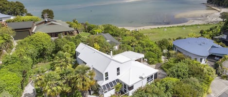 Setting of Beach house with studio units attached.