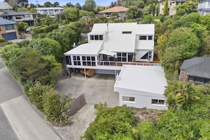 Birds eye view of private property onto beach.