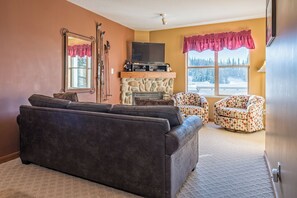 Living Room with TV and Gas Fireplace 
