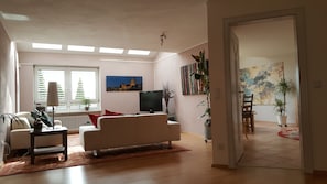 Living room with kitchen to the right
