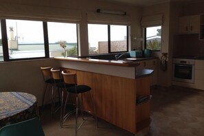 Breakfast bar and kitchen upstairs