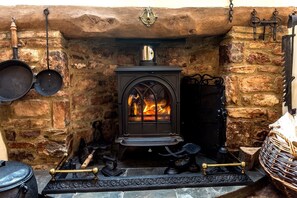 Warm yourself by the wood burning stove