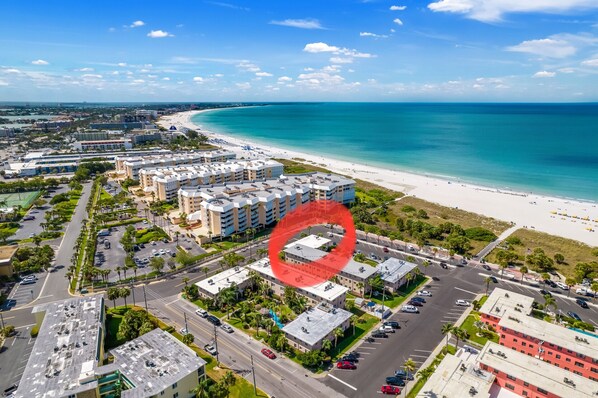 Just cross a few parking spaces & the dunes to have your toes on the sand!