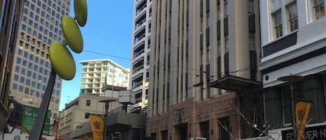 Apartment Building (light brown building)