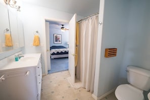 Lovely bathroom with universal design toilet and shower/tub off the master bedroom.