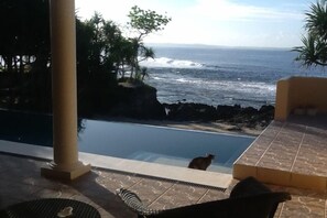 Infinity Pool overlooking beach and bay from loggia off main casa