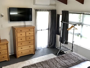 Master bedroom with air-conditioning and large screen Smart TV