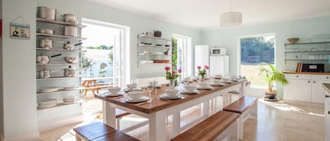 South facing kitchen with doors to garden
