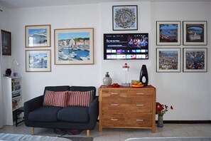 New sofa, chest of drawers & interactive TV.
