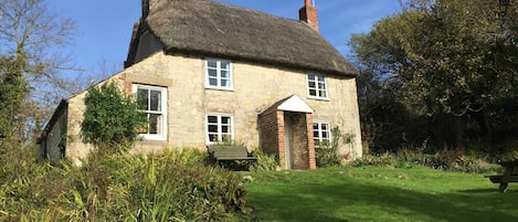 Front of cottage facing out over a sizeable lawn