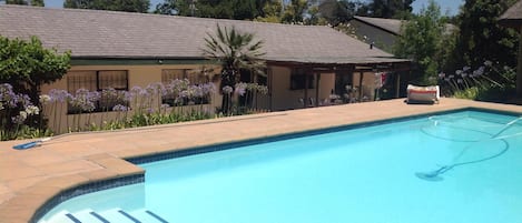 Pool at the rear of the house in very private garden 