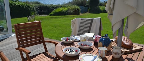 Brunch on the patio overlooking the sea