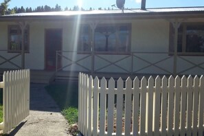 welcoming gate and classic picket fence