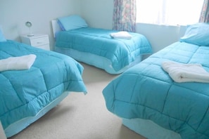 3 single beds in 2nd bedroom