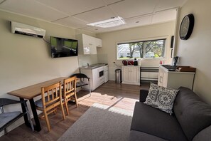 Living area with kitchenette.