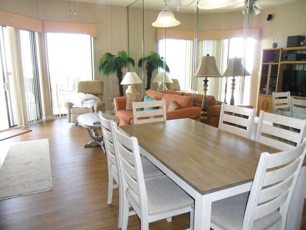 Living/Dining w/ sliding glass door to patio/balcony