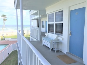 View approaching front door and signature Sea Star bench