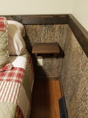 Little shelf on each side of the bed for your phone or glasses or whatever....
