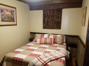 Bedroom with queen bed.
