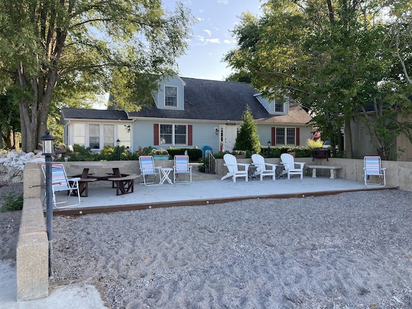 35'x14' cement patio, eco-friendly 8-person table, fire pit, lots of space.