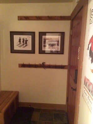 entry way with vintage ski culture photos