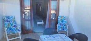 Spacious balcony with all day sun & sea view 
