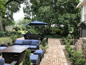 Brick Patio with Sitting area/Fire table , Dining for 6, and Grill