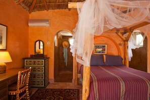Romantic canopy bed with fan
