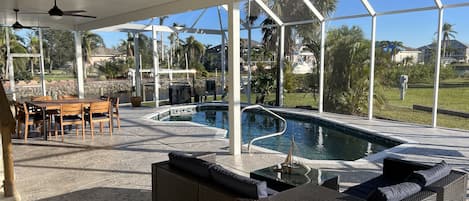 new pool cage and lanai area. Large TV, heated pool availabe for additional fee