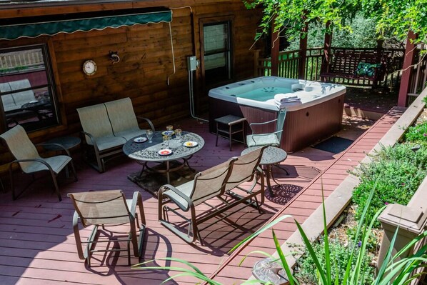 Enjoy the back yard with a dip in the hot tub, or lunch al fresco!