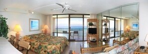 King bed and view out from the lanai.