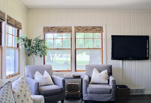 Living room views of the oak grove, perfect for recharging after a full day!