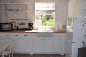 Full kitchen with farm sink