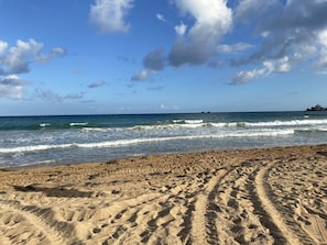 Three minute walk to the beach in front.