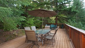 Deck with BBQ and patio seating off the kitchen.