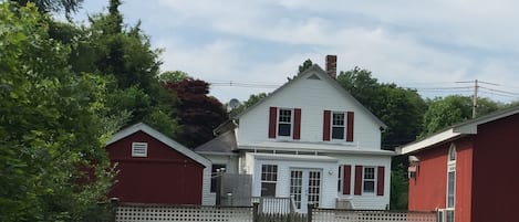 The back of the house, which is the main entry.