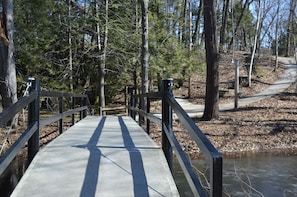 Park your car and walk over the bridge to our island lake house!