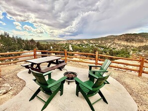 Yurt 8 has spectacular views to the west for sunsets in the evening, stargazing at night and mountain and valley views in the daytime.  BBQ grill and gas fire pit near the sitting area.