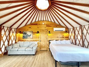 Yurt 8 has a king bed and sofa bed with plenty of space to relax after a long day of hiking Zion or Bryce Canyons.  It has heating and airconditioning. Yurt 8 also sits within walking distance to Red Hollow Slot Canyon just around the corner.  