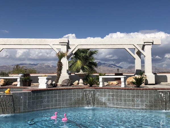 Fun, relaxing pool backyard.