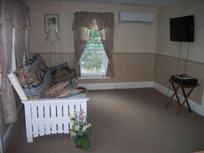 Living room with flat screen TV.