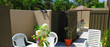 Private, furnished, tropical garden patio.