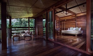 Stylish loft in stilted wooden longhouse