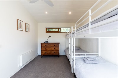 Unique 2 bedroom riverside Boathouse in central Barwon Heads